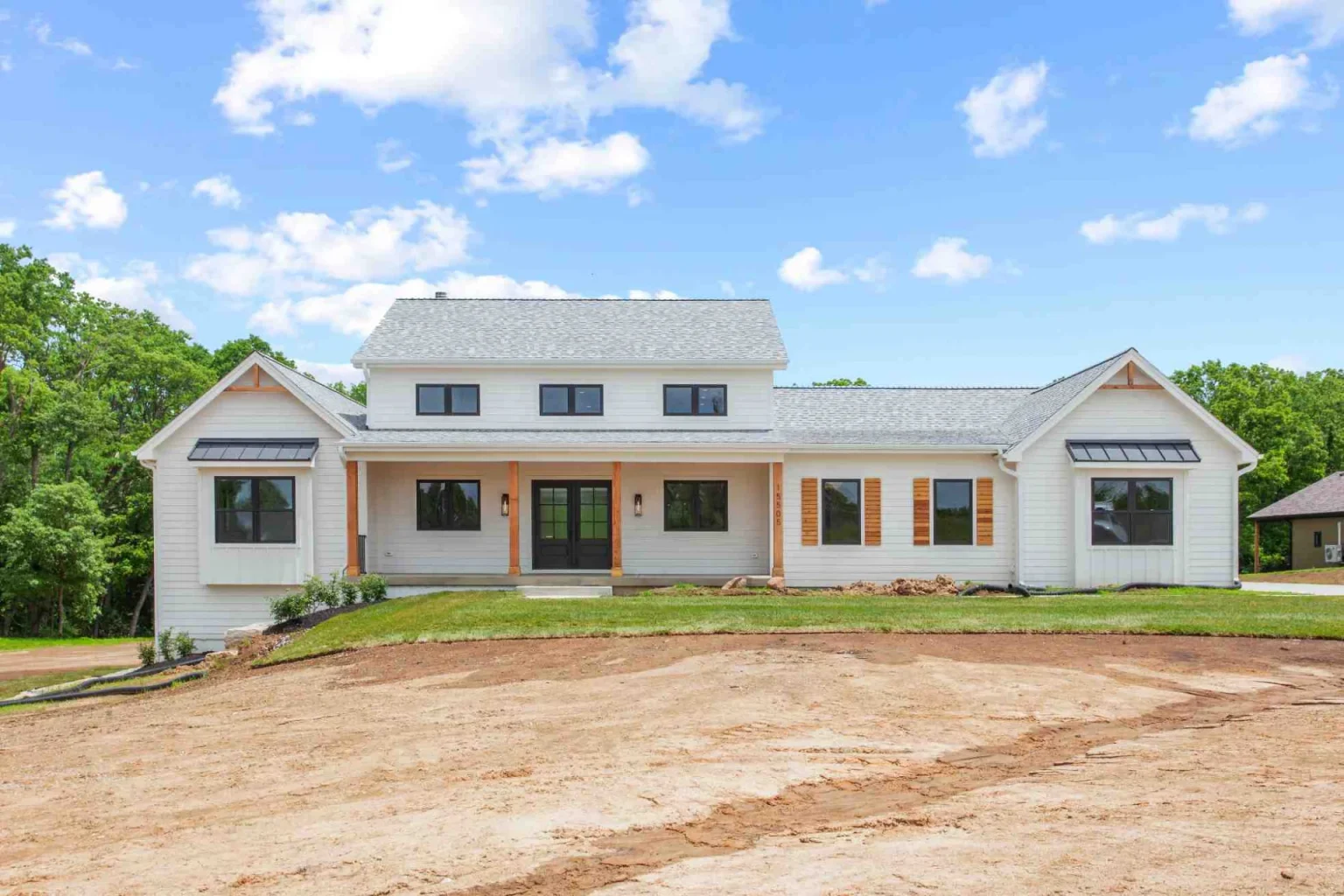 Brand New Farmhouse Style White Home Exterior in Ashland, MO